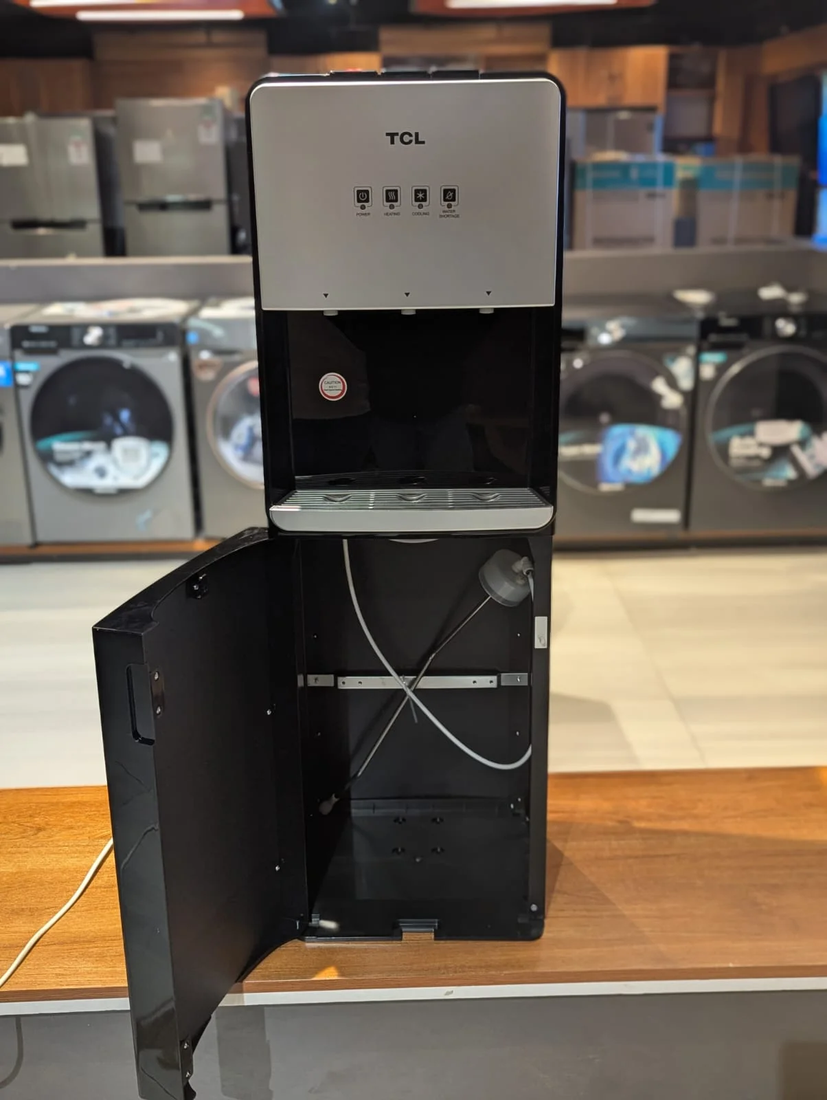 TCL bottom load dispenser